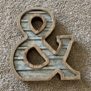 “&” symbol wall decor